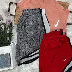 Three pairs of Nike brand, size small shorts